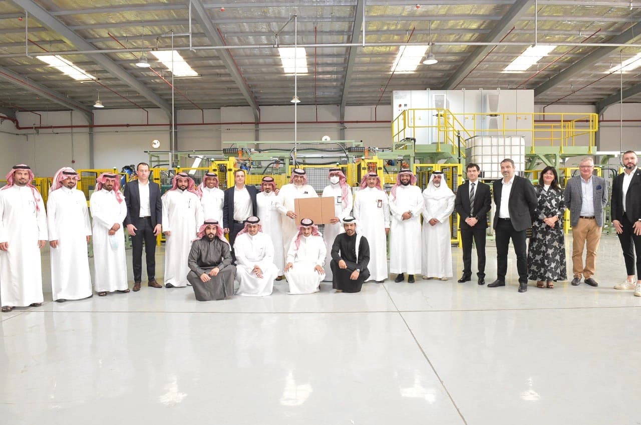 Gregor Brajović with international collaborators in a production facility