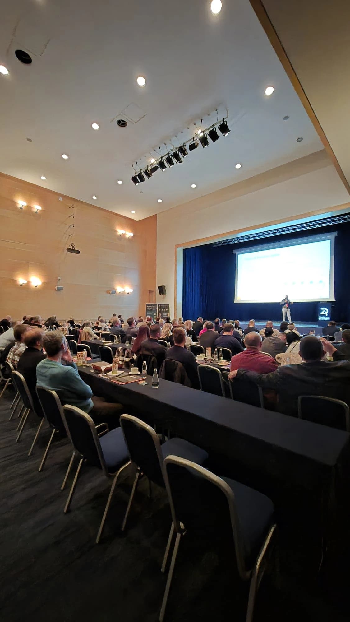 A ZeeQuest presentation at an industry conference