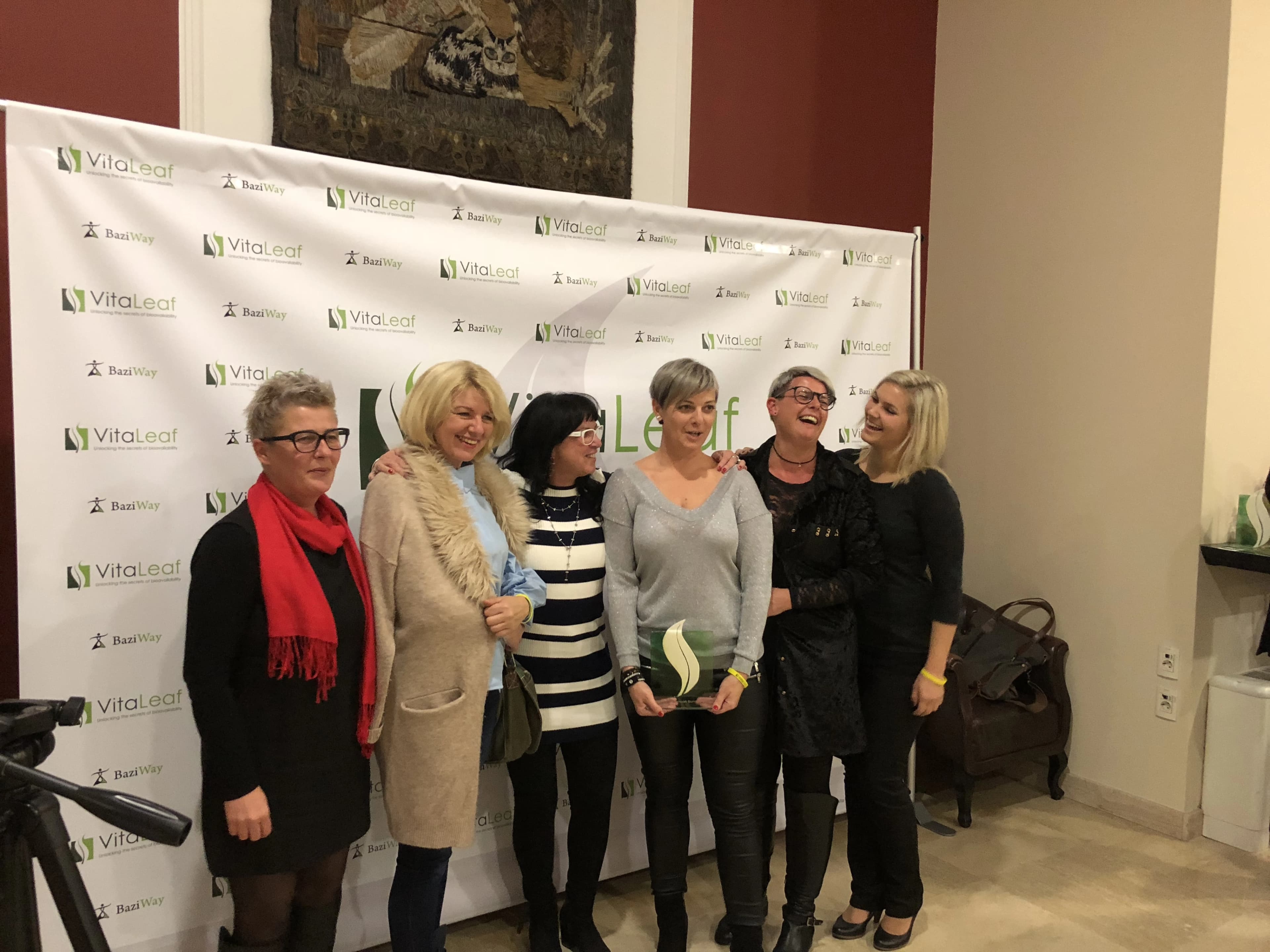 Community members celebrating at a VitalLeaf event