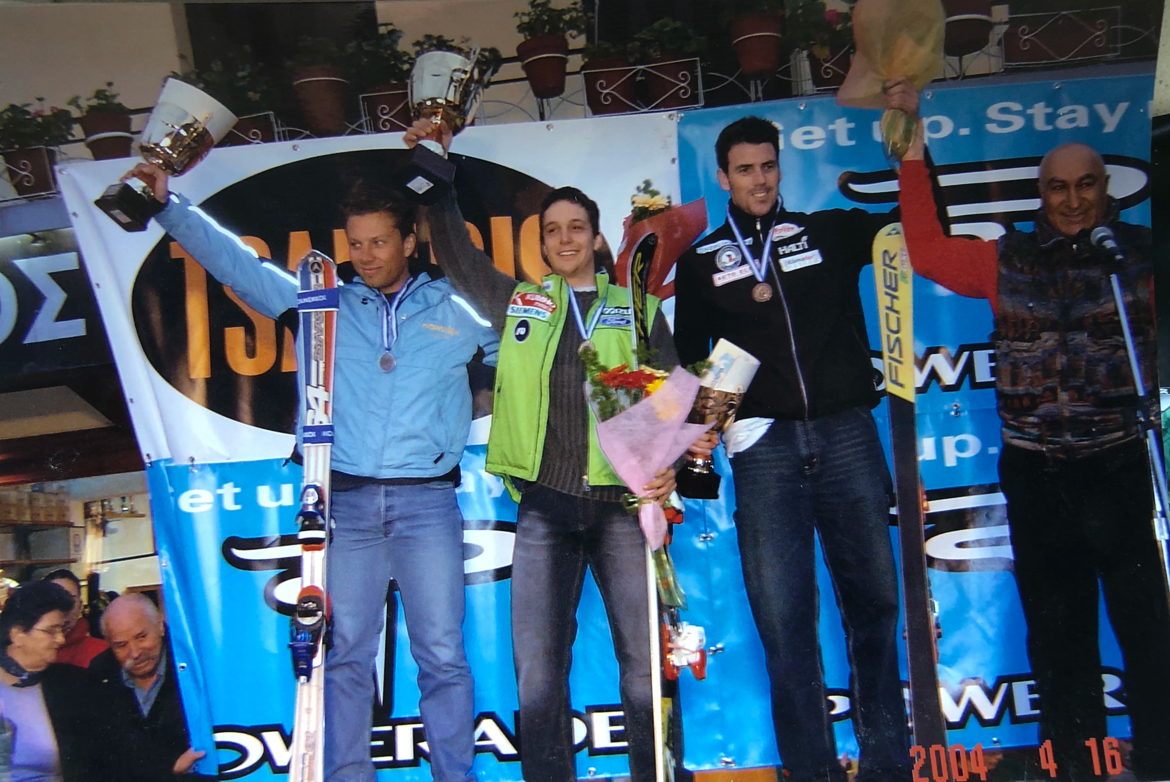 A Slovenian alpine ski team podium celebration