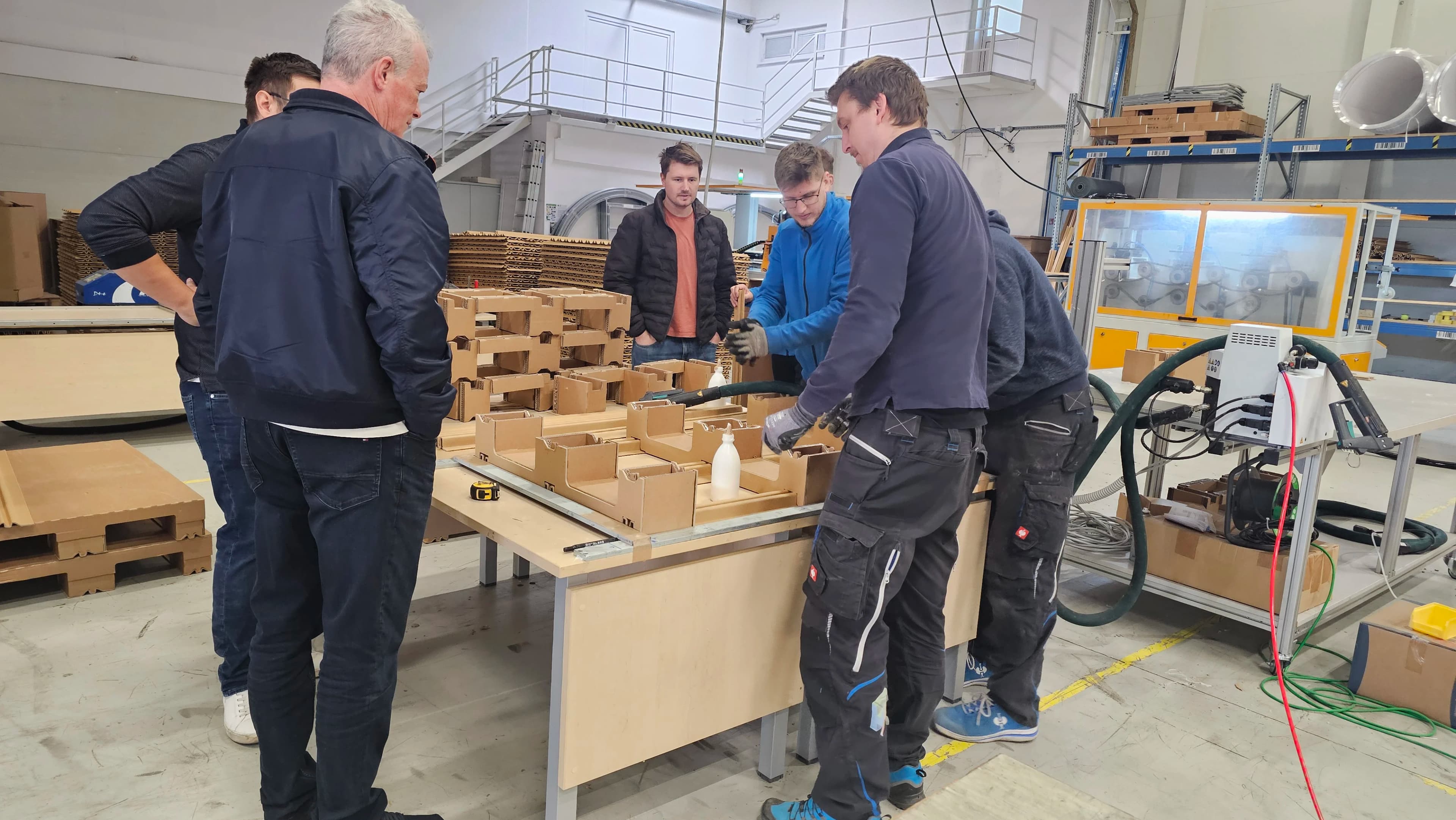 Engineers assembling KraftPal components