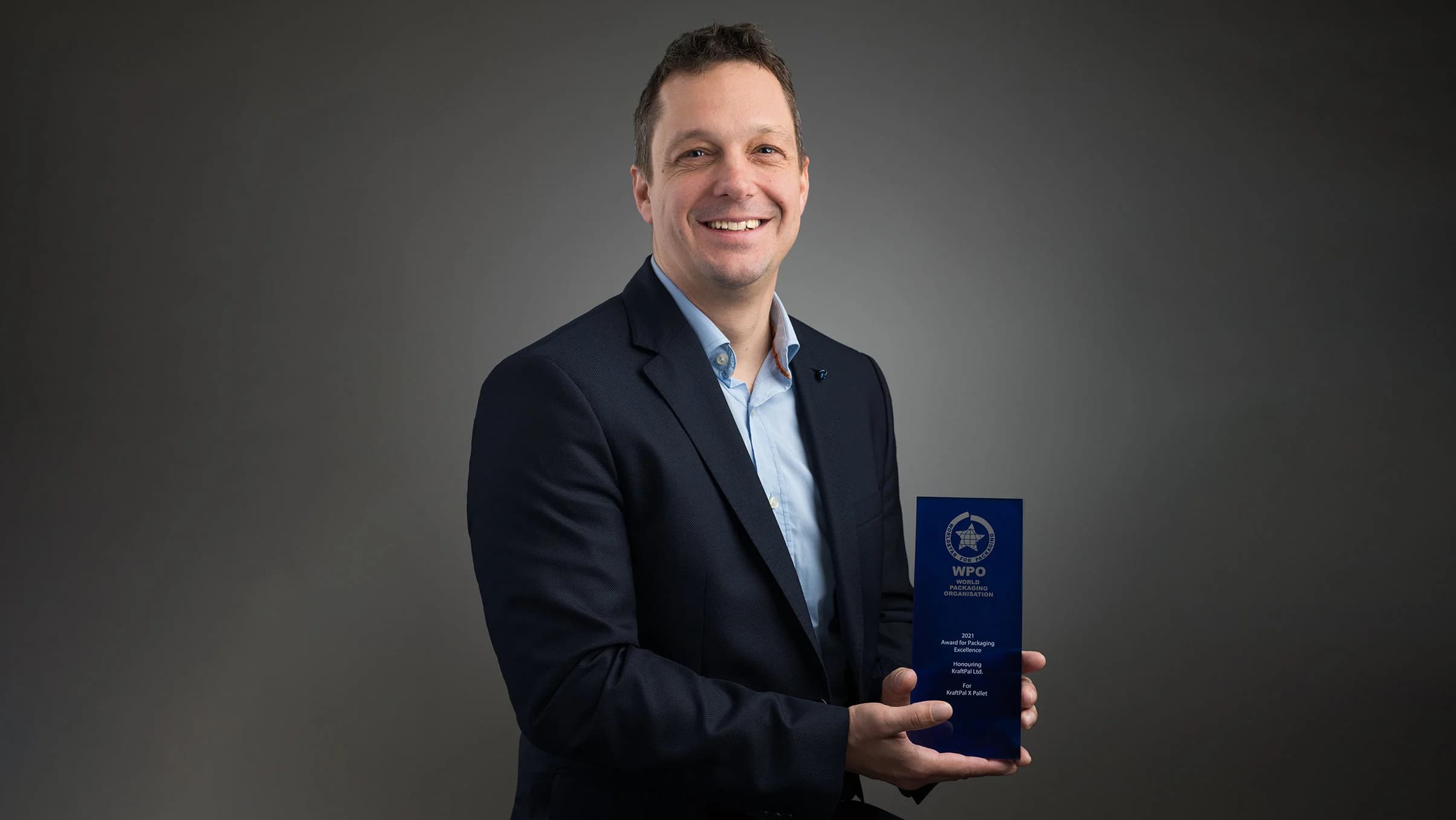 KraftPal founder holding an international industry award