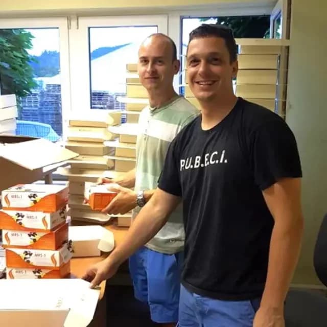 Two KraftPal team members working together in an office